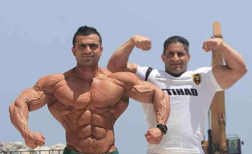 xcomp:  Khalil Asadi and his coach, Yousef Karimi.