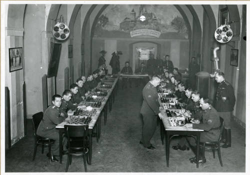 vonholeczek:Parallel chess tournament of Czechoslovak Palace Guard in 1928. Prague, Hradčany palace.