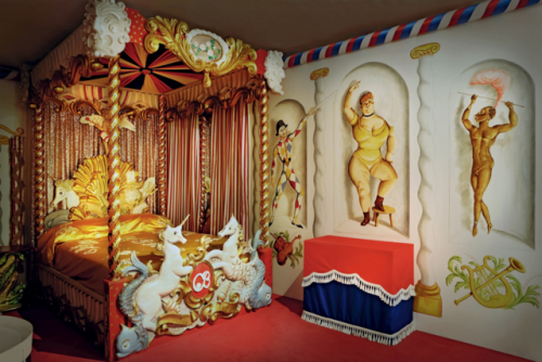 Gilded Rococo circus-themed bedroom of Cecil Beaton, complete with a Botticelli-esque shell-laden be