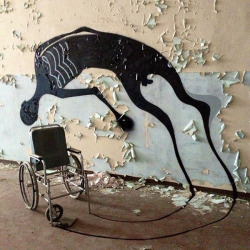danleetodd:  Brazilian street artist Herbert Baglione has somehow managed to make an abandoned psychiatric hospital in Parma, Italy even creepier with his paintings of shadows.  The way Baglione’s ‘shadows’ creep out from disused wheelchairs