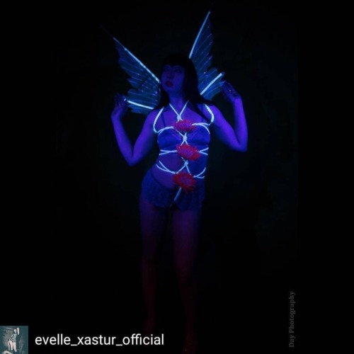 agreeableagony:  Regrann from @evelle_xastur_official  -  Photo by @dayphoto66  Shibari work by @crossingshadows  Rope from @agreeableagony  #evelle #shibari #uv #glow #photoshoot #alternativemodel #fairy #flowers #wings #ropebondage #rope #ropebottom