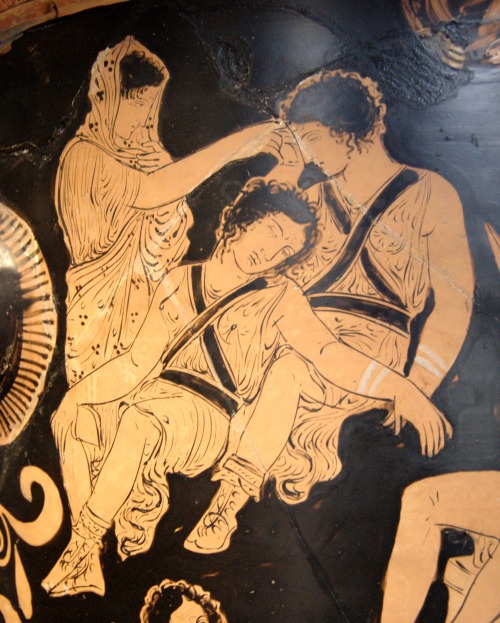 Clytemnestra attempts to awaken the sleeping Furies so that they can resume their pursuit of Orestes