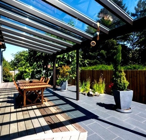 Paris DeckInspiration For A Mid-sized, Modern Backyard Deck Renovation Featuring A Container Garden And