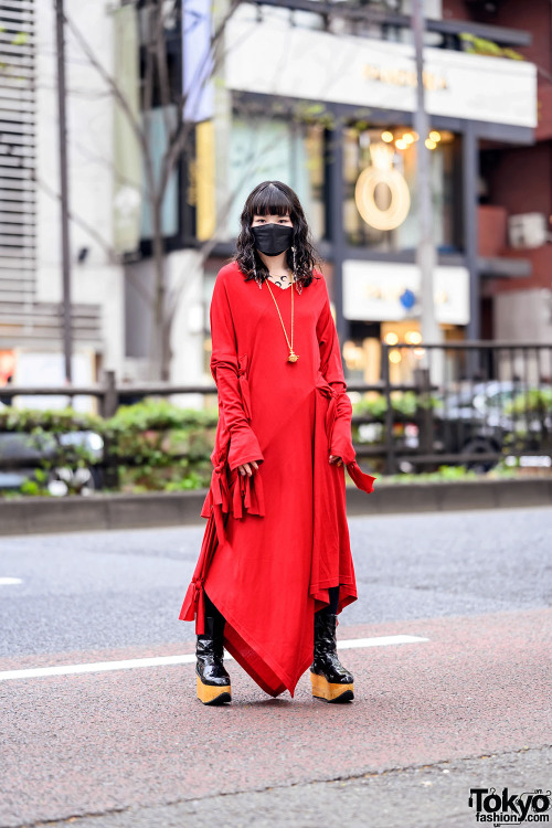 Japanese artist Miyu on the street in Harajuku wearing a ribbon dress by Japanese fashion brand LIMI