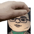 Plushie of Leonard Hofstadter from The Big Bang Theory being petted on the head :3