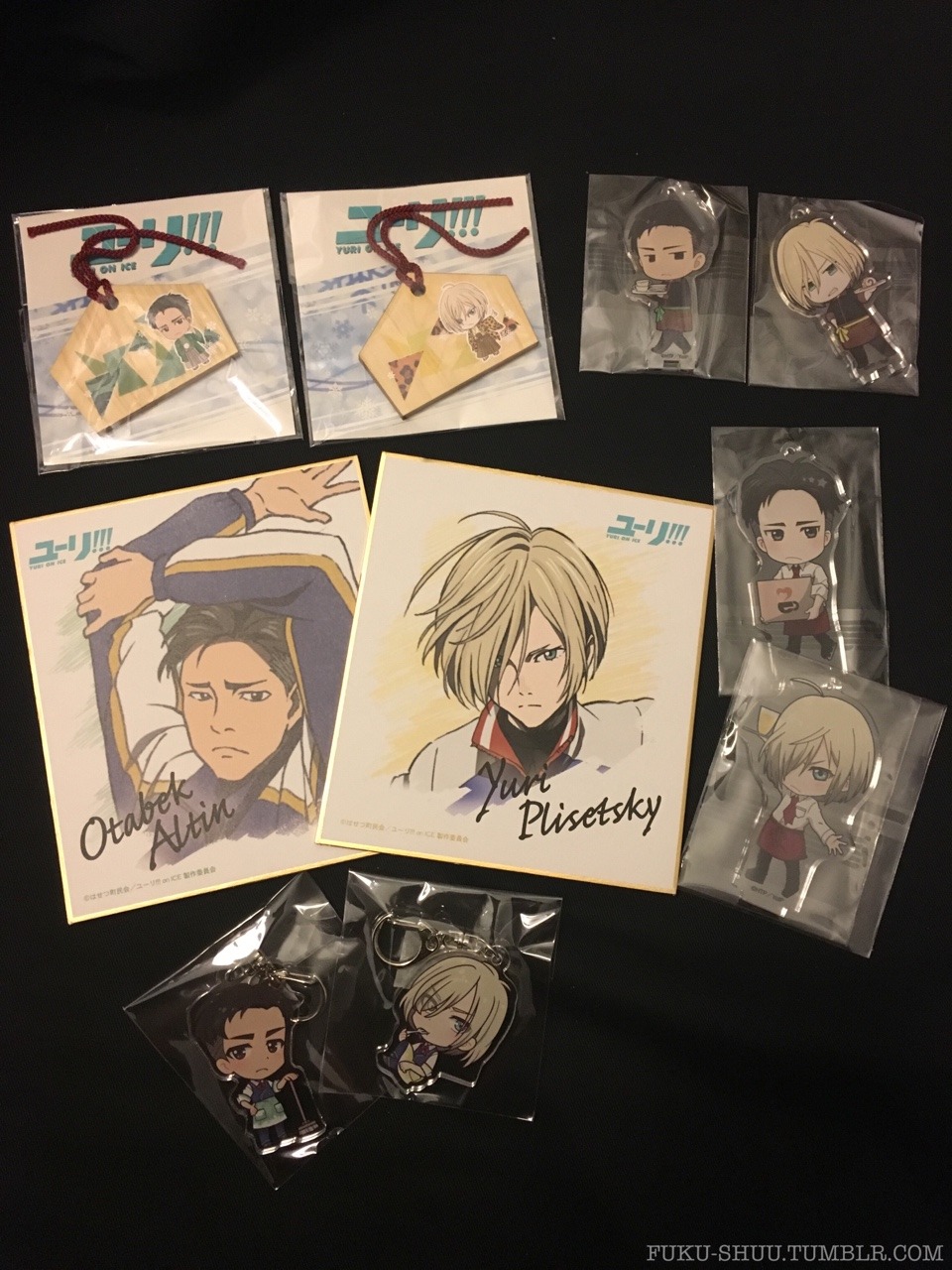 I received a bunch of official YOI merchandise sets today - picked out Otabek and