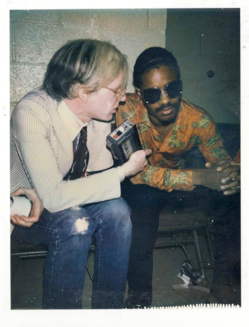 soundsof71:Andy Warhol with Stevie Wonder backstage Madison Square Garden, at a Rolling Stones show 