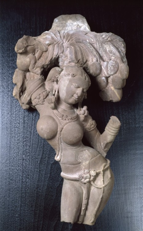 Art of the Day: Woman Beneath a Mango Tree Carved as a bracket to be placed between a pillar and a c