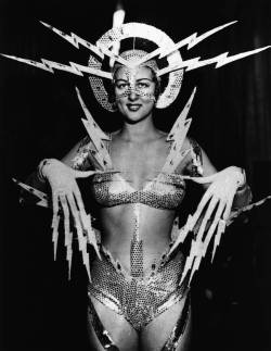 driveintheaterofthemind: Miss Radio Queen 1939 Elmira Humphreys, the “Radio Queen,” wears a costume covered with cardboard lightning bolts. She will wear it on the Radiolympia stage. c. 1939 