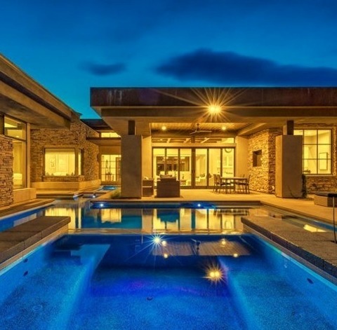 Las Vegas LapExample Of A Large Minimalist Backyard Concrete Paver And Custom-shaped Lap Hot Tub Design