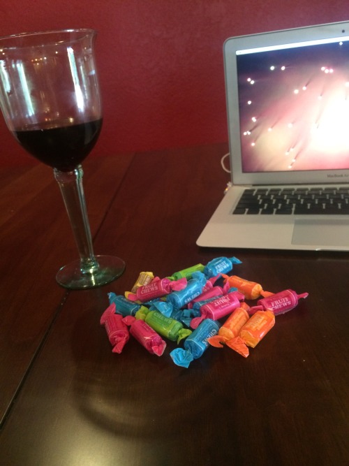 Pile of candy and goblet of wine at noon? adult photos