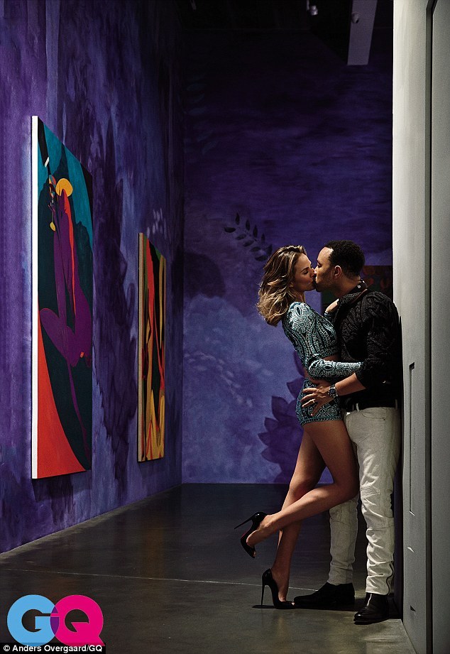 celebritygossipbyrangi:John Legend and his wife, Chrissy Teigen pose together in