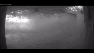 emt-squidward: sixpenceee:  A view from inside the boys gymnasium at Henryville High School as the March 2, 2012 EF-4 tornado takes a direct hit.  first the lights go out, then the party starts 