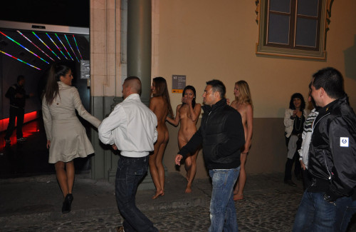 nakedgirlsdoingstuff:  Three girls show up to a club naked.