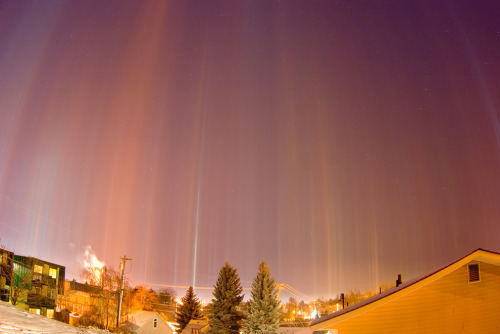 Light pillars over Moscow.
A light pillar is a visual phenomenon created by the reflection of light from ice crystals with near horizontal parallel planar surfaces.