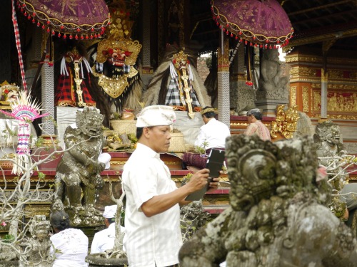 Masks of Barong and Rangda worshiped at balinese temple