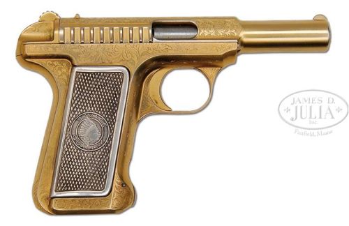 Rare gold plated and factory engraved Savage Model 1907.Sold at Auction: $12,650