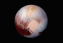 timemagazine:  See Pluto In Color For The First Time “NASA released a false-color image of Pluto on Thursday, revealing an unprecedented view of the planet’s vividly contrasting patches of terrain.” Photo: NASA/REUTERS Read more 