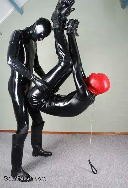rubberknite: Just the way a slave should be fucked, in full rubber and bound.