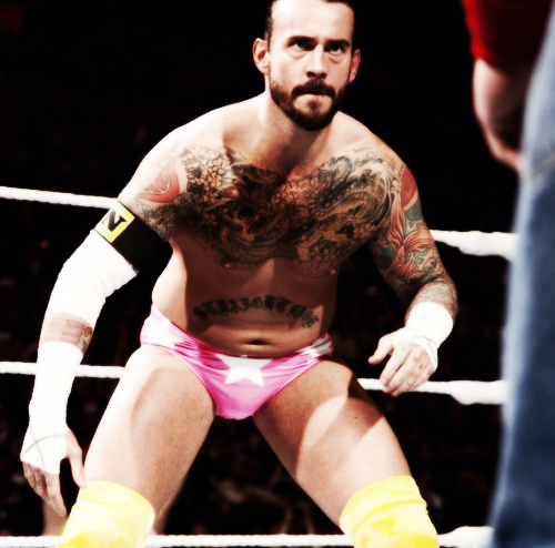 dabestintheworld:  7/50 Photos of CM Punk ~   Punk bulges in pink tights!