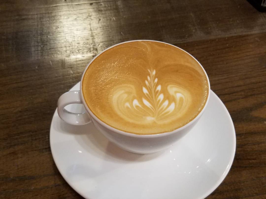 Book, conversation, and a latte too pretty to drink. Good way to spend a holiday afternoon. (at The Vienna Coffeehouse)