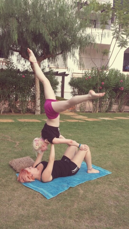 thegirlwiththeeverchanginghair:  MORE! Beth and I doing a bit of acro yoga in spain ^.^  