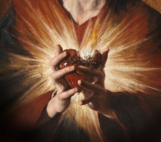 Why is the Sacred Heart on fire?