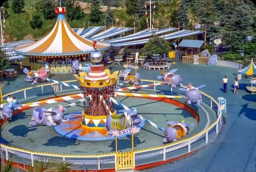 &ldquo;Dumbo Flying Elephants&rdquo; in Vintage Fantasyland! Refreshment stand at the top, and the e