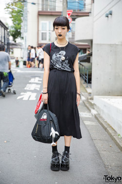 tokyo-fashion:  17-year-old Chikio on the street in Harajuku wearing all black fashion (mostly resale) with black lipstick, a Vivienne Westwood armor ring, and black platform creepers with chains and studs.