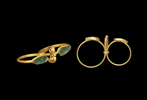 Roman gold and green glass double ring, c. 1st-2nd centuries CE. From Timeline Auctions.