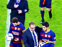six-refs:  messi and suarez with match ball 
