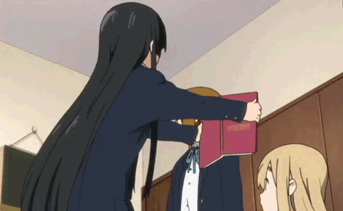 cheeralism:  gibsonsenpai:  akiyamn:  Ritsu doesn’t like that damn book.  *dbz noises*   