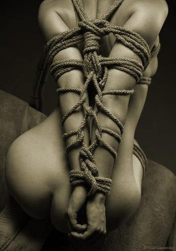 tiemeupandfuckme:  thebdsmspot:  Tied up nice ;)  Tied, abused, willing.
