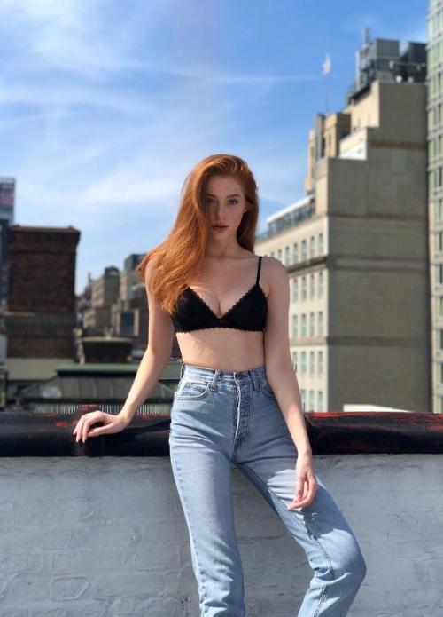 Madeline Ford on a rooftop