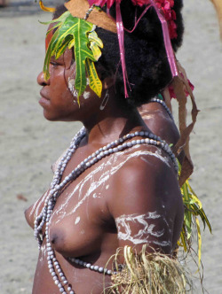 Topless Papuan girl at the Lake Sentani