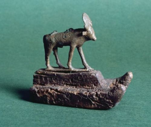 Bronze figure of the Apis bull with sun disk. Late Period, ca. 664-332 BC. Now in the Ashmolean Muse