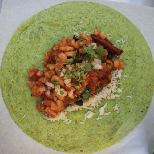 Shrimp Wrap - $9.00
rice, black beans, chop onion, cilantro, and shrimp in adobo sauce all in a 12 inch Spinach flour tortilla