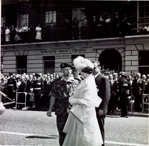 Colonel Chateau-Jobert greets Queen Elizabeth The Queen Mother, before accompanying her to inspect t