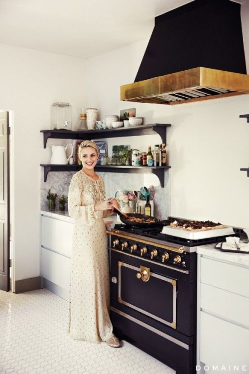 {Some lunch-time inspiration - a Monday Mix of kitchens with beautiful black ranges…}