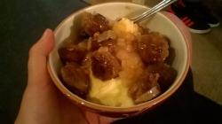 Lamb meatballs and onion sauce over mashed