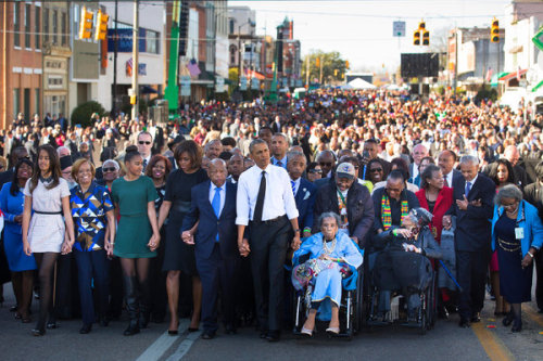 inothernews:President Obama, Representative John Lewis and others march toward the Edmund Pettus Bri