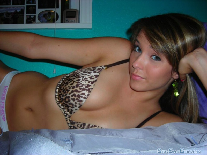onlyhottieshere:  I think this young babe wants something  girl lying on her bed