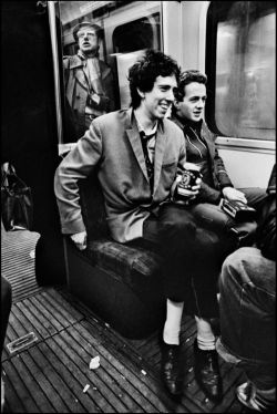theplanetofsound:  Mick Jones &amp; Joe Strummer photographed on the London Underground by Chalkie Davies, 1977.