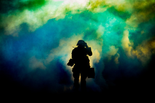 U.S. Marines with 1st Marine Division running through CS gas during the hike portion of the 1st MARD