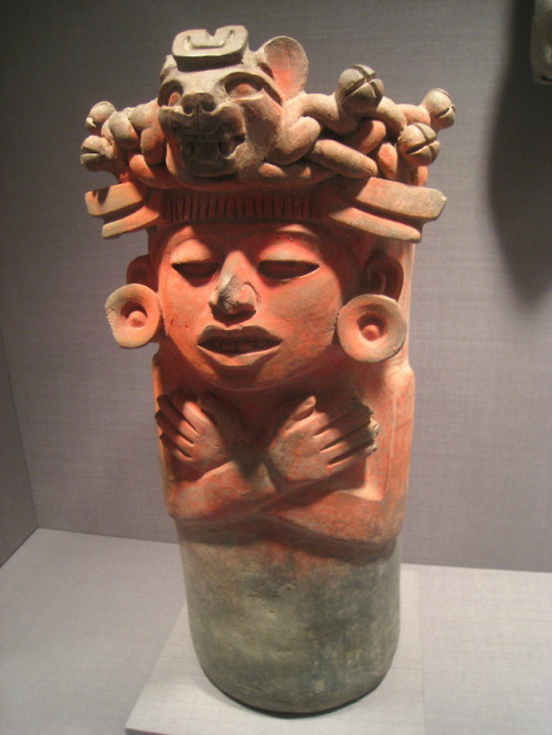 Zapotec urn (ceramic with vermilion) in the shape of a human figure, from Monte Albán, Mexico.  Arti