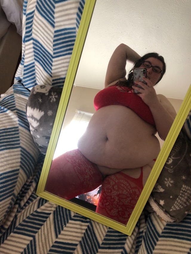 thegoodhausfrau:Dusty mirror lingerie preview. It’s all about these red legs today. Or rather the way the garter frames my pale butt. Something big and red would be a good addition…
