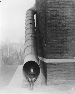 sixpenceee:  The following are examples of fire escape chutes. These were used when conventional fire escape stairways were impractical.  