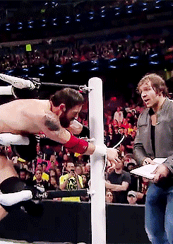 armitagesbeardarchive-blog: dean ambrose forces wade barrett to sign the contract for their match this sunday at fast lane