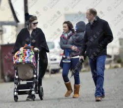 adelexlondon:  LQ photos with tags: 3 April 2013 - Adele makes funny faces to son Angelo in Brighton, U.K [PART 2]. 