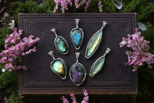 All these beautiful wire wrapped sterling silver labradorite pendants are available at my Etsy Shop 